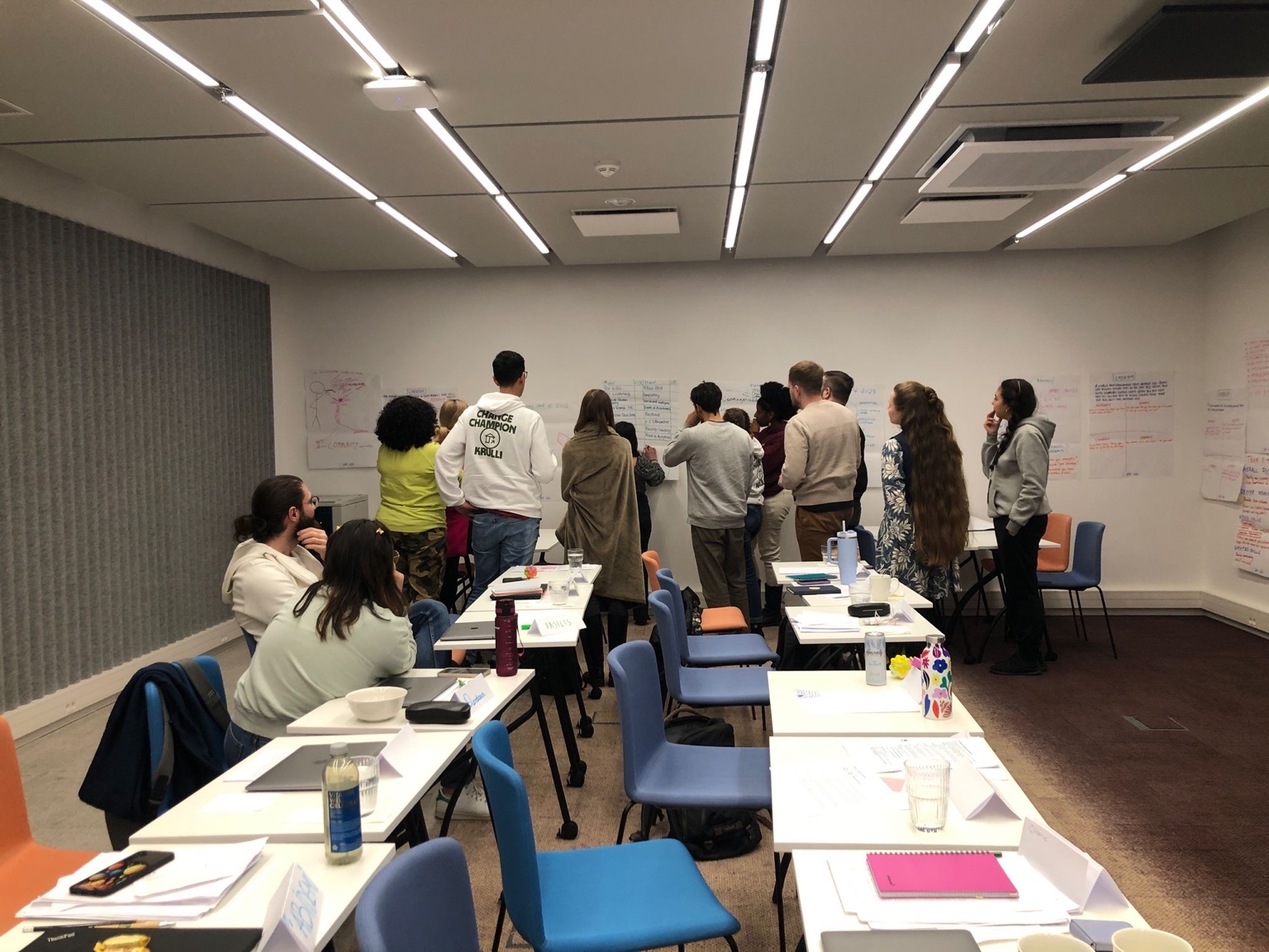 Participants working together during an interactive training activity